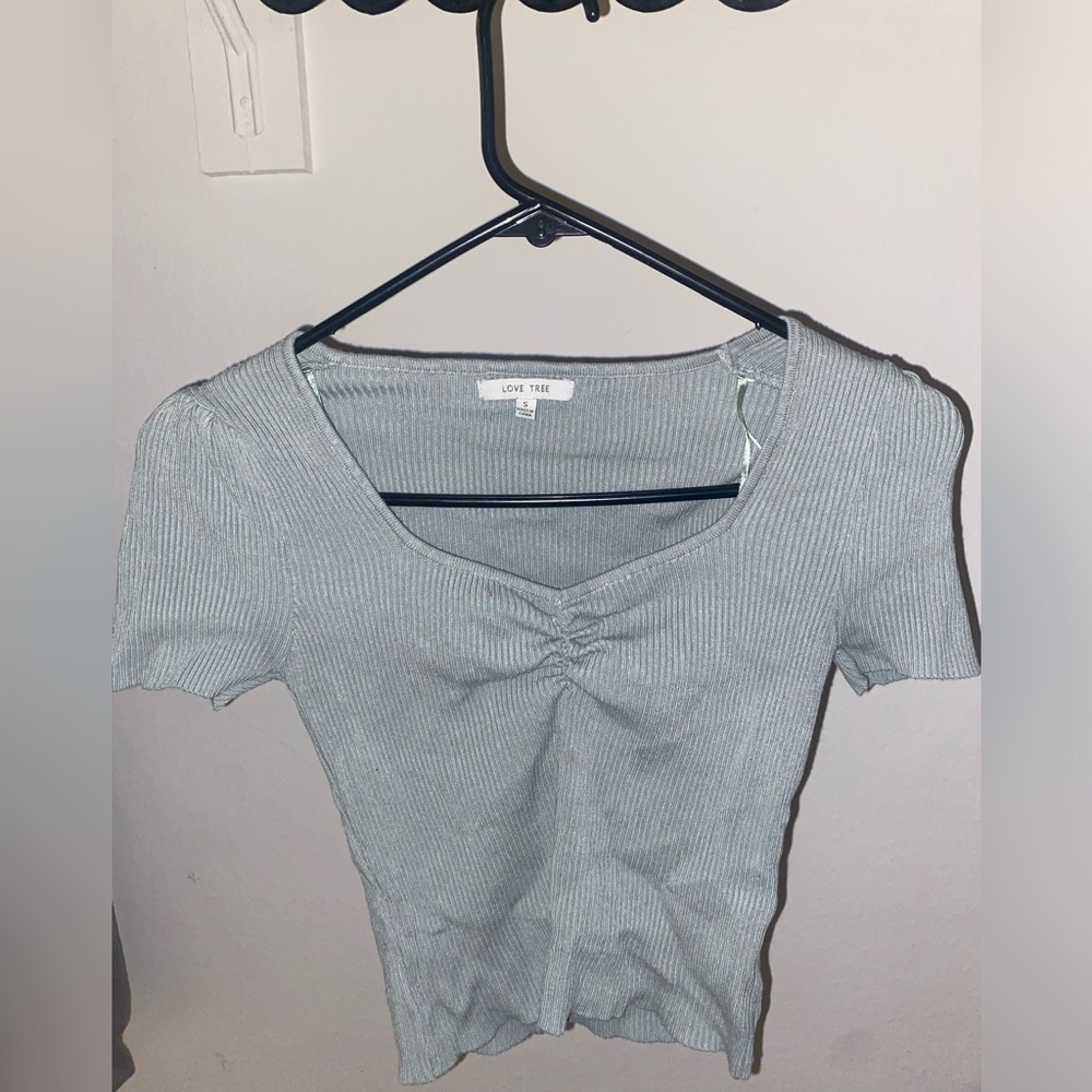 Size S . Short sleeve shirt from Love Tree